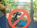 Aquarium sign - If the fall does not kill you, the crocodile will (flash)